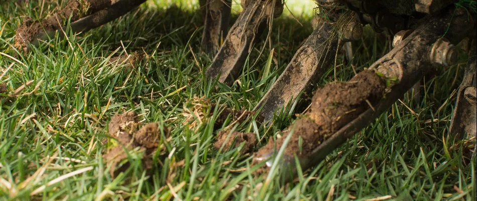 Aerator machine on a lawn in Ann Arbor, MI.