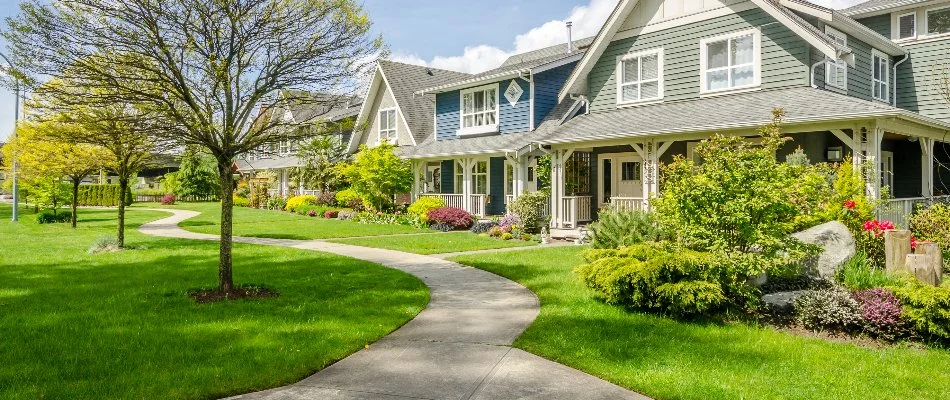 Manicured landscaping in front of homes in South Lyon, MI.